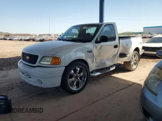 2004 Ford F-150 XL with VIN 2FTRF07234CA15846, listed as a Copart auction lot 74149454 with 141,831 mi miles and Salvage title. Bid and sale history available at DreamBid. Image 1.