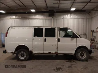 2002 Chevrolet Express Cargo with VIN 1GCHG35R421191281, listed as a IAAI auction lot 42207627 with 212,417 mi miles and . Bid and sale history available at DreamBid. Image 14.