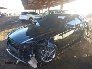 2018 Infiniti Q50 Luxe with VIN JN1EV7AP7JM590173, listed as a IAAI auction lot 41298515 with 99,415 mi miles and . Bid and sale history available at DreamBid. Image 14.
