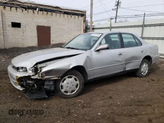 1992 Toyota Camry LE z VIN 4T1SK12E4NU138119, wystawiony jako Copart lot #51475195 z przebiegiem 106 257 mil mil oraz Nie do naprawy • Non repairable. Historia ofert i sprzedaży dostępna na DreamBid. Obrazek 1.