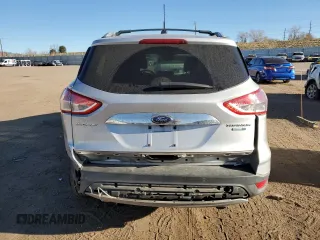 2014 Ford Escape Titanium with VIN 1FMCU9J9XEUB10861, listed as a Copart auction lot 50766115 with 134,469 mi miles and Salvage Title. Bid and sale history available at DreamBid. Image 6.