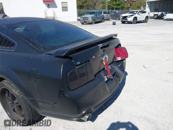 2005 Ford Mustang Deluxe with VIN 1ZVFT80N655136118, listed as a IAAI auction lot 41811969 with 104,071 mi miles. Bid and sale history available at carsss.com. Image 6.
