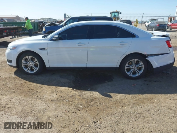 2016 Ford Taurus SEL with VIN 1FAHP2E84GG102031, listed as a IAAI auction lot 40597227 with 167,410 mi miles and . Bid and sale history available at DreamBid. Image 14.