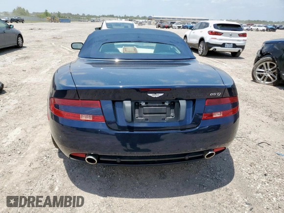2007 Aston Martin DB9 z VIN SCFAD02A57GB08568, wystawiony jako Copart lot #57238375 z przebiegiem 41 255 mil mil oraz Tytuł czysty. Historia ofert i sprzedaży dostępna na DreamBid. Obrazek 6.