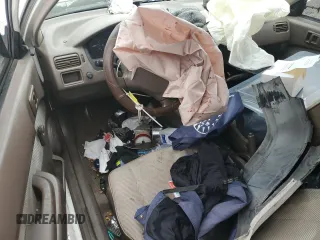 1996 Toyota Tercel DX z VIN JT2AC52L5T0145290, wystawiony jako Copart lot #45027855 z przebiegiem 186 673 mil mil oraz Szkoda całkowita • Salvage title. Historia ofert i sprzedaży dostępna na DreamBid. Obrazek 8.