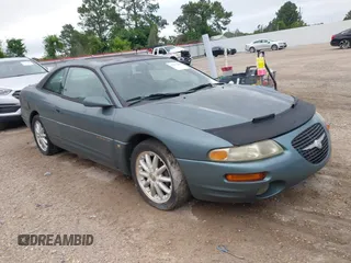 1999 Chrysler Sebring LXi z VIN 4C3AU52N9XE018706, wystawiony jako IAAI lot #42151442 z przebiegiem 119 546 mil mil oraz . Historia ofert i sprzedaży dostępna na DreamBid. Obrazek 1.