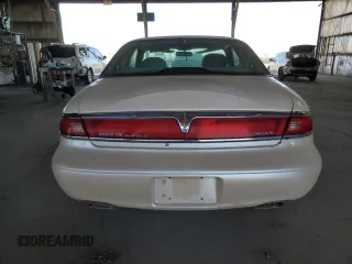 1997 Lincoln Mark VIII with VIN 1LNLM91V3VY602590, listed as a Copart auction lot 44431555 with 157,445 mi miles and Clean Title. Bid and sale history available at DreamBid. Image 6.