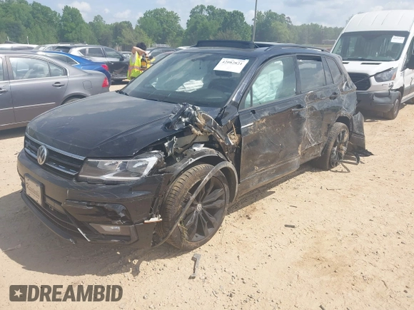 2021 Volkswagen Tiguan SE z VIN 3VV3B7AX5MM027369, wystawiony jako IAAI lot #42082821 z przebiegiem 74 024 mil mil oraz . Historia ofert i sprzedaży dostępna na DreamBid. Obrazek 4.