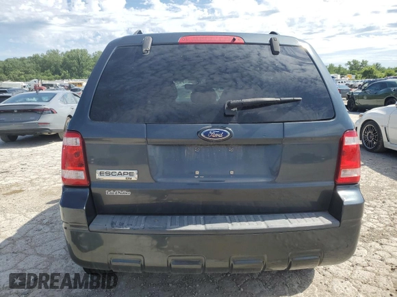 2008 Ford Escape XLT with VIN 1FMCU03198KA67732, listed as a Copart auction lot 56878455 with 105,619 mi miles and Salvage title. Bid and sale history available at DreamBid. Image 6.