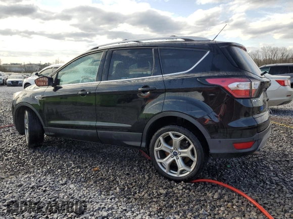 2017 Ford Escape Titanium with VIN 1FMCU0J92HUB12281, listed as a Copart auction lot 49615875 with 126,590 mi miles and Salvage Title. Bid and sale history available at carsss.com. Image 2.
