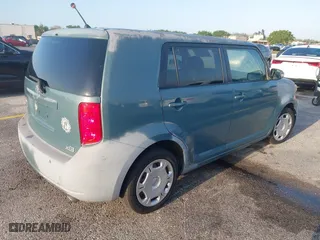 2008 Scion xB with VIN JTLKE50E581004400, listed as a IAAI auction lot 42012956 with 164,438 mi miles. Bid and sale history available at carsss.com. Image 4.