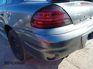 2004 Pontiac Grand Am SE with VIN 1G2NE52F54M560234, listed as a IAAI auction lot 41716361 with 256,571 mi miles. Bid and sale history available at carsss.com. Image 13.