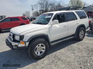 2000 Toyota 4Runner SR5 with VIN JT3HN86R5Y0286565, listed as a Copart auction lot 49271215 with 230,509 mi miles and Salvage Title. Bid and sale history available at carsss.com. Image 1.