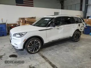 2020 Lincoln Aviator Reserve z VIN 5LM5J7XCXLGL02153, wystawiony jako Copart lot #54517115 z przebiegiem 57 449 mil mil oraz Szkoda całkowita • Salvage title. Historia ofert i sprzedaży dostępna na DreamBid. Obrazek 1.