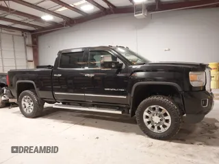 2015 GMC Sierra 2500HD available WiFi Denali with VIN 1GT120E89FF117773, listed as a IAAI auction lot 41587823 with 251,371 mi miles. Bid and sale history available at carsss.com. Image 13.