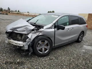2022 Honda Odyssey EX with VIN 5FNRL6H57NB004556, listed as a Copart auction lot 49288215 with 128,460 mi miles and Salvage Title. Bid and sale history available at DreamBid. Image 1.
