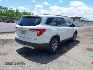 2019 Honda Pilot EX-L with VIN 5FNYF5H42KB026108, listed as a IAAI auction lot 42387593 with 112,556 mi miles and . Bid and sale history available at DreamBid. Image 4.