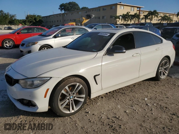 2015 BMW 4 Series 428i with VIN WBA4A5C50FG052177, listed as a Copart auction lot 86093994 with 127,956 mi miles and Salvage Title. Bid and sale history available at DreamBid. Image 1.