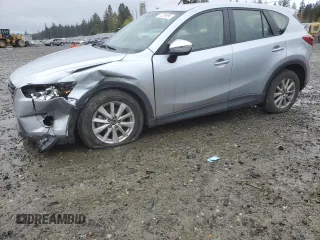 2016 Mazda CX-5 Sport z VIN JM3KE4BY5G0726376, wystawiony jako Copart lot #52009995 z przebiegiem 113 533 mil mil oraz Szkoda całkowita • Salvage title. Historia ofert i sprzedaży dostępna na DreamBid. Obrazek 1.
