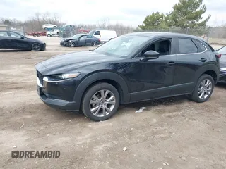 2021 Mazda CX-30 Preferred z VIN 3MVDMBCL5MM205824, wystawiony jako IAAI lot #41991942 z przebiegiem 58 112 mil mil oraz . Historia ofert i sprzedaży dostępna na DreamBid. Obrazek 17.