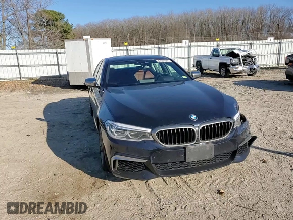 2020 BMW 5 Series M550i xDrive with VIN WBAJS7C0XLCE44248, listed as a Copart auction lot 48660045 with 73,949 mi miles and Salvage title. Bid and sale history available at DreamBid. Image 11.