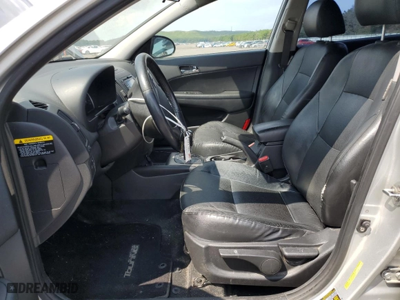 2012 Hyundai Elantra Touring SE with VIN KMHDC8AE0CU146375, listed as a Copart auction lot 66985734 with 68,813 mi miles and Salvage Title. Bid and sale history available at carsss.com. Image 7.