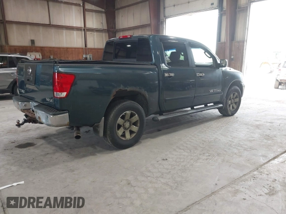 2005 Nissan Titan LE with VIN 1N6AA07B55N500154, listed as a IAAI auction lot 42455068 with 147,180 mi miles and . Bid and sale history available at DreamBid. Image 4.
