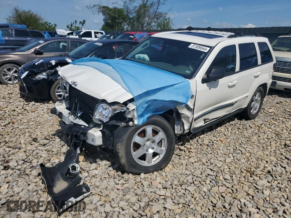 2009 Jeep Grand Cherokee Laredo with VIN 1J8HR48P89C532571, listed as a Copart auction lot 57309544 with 203,423 mi miles and Non Repairable. Bid and sale history available at carsss.com. Image 1.