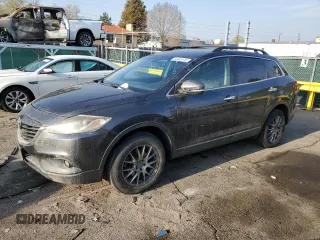 2015 Mazda CX-9 Grand Touring z VIN JM3TB3DV2F0453812, wystawiony jako Copart lot #54445115 z przebiegiem 176 067 mil mil oraz Szkoda całkowita • Salvage title. Historia ofert i sprzedaży dostępna na DreamBid. Obrazek 1.