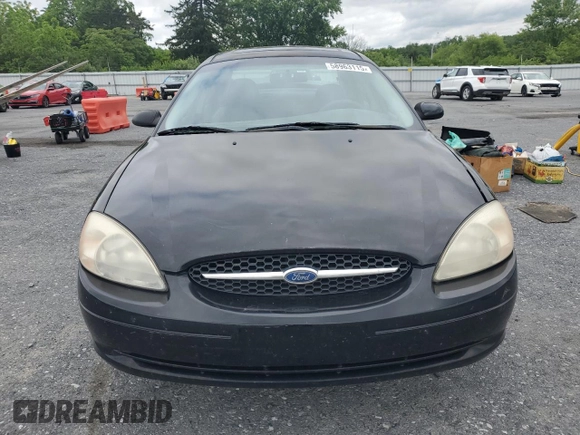 2001 Ford Taurus SEL with VIN 1FAFP56S01A258399, listed as a Copart auction lot 58963115 with 162,989 mi miles and Salvage title. Bid and sale history available at DreamBid. Image 5.