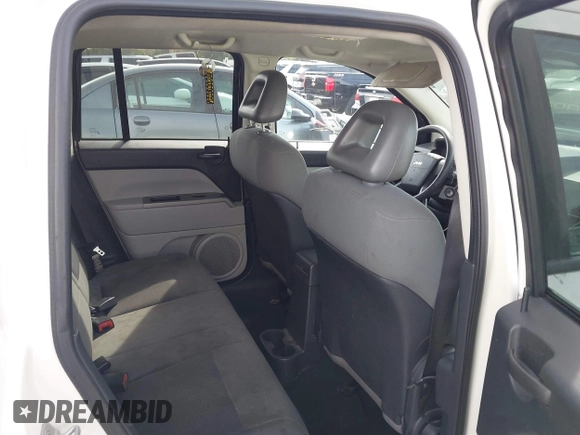2007 Jeep Compass Sport with VIN 1J8FT47W77D145745, listed as a IAAI auction lot 41687495 with 218,231 mi miles. Bid and sale history available at carsss.com. Image 8.