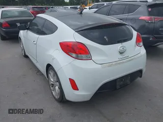 2013 Hyundai Veloster w/Black Int с VIN KMHTC6AD5DU166601, выставлен на аукционе IAAI как лот 42182995 с пробегом 143 106 миль миль и . История ставок и продаж доступна на DreamBid. Изображение 3.