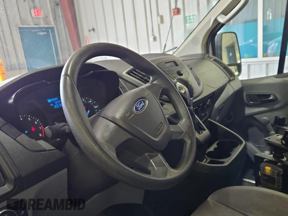 2016 Ford Transit Cargo z VIN 1FTYE1YM9GKB19505, wystawiony jako IAAI lot #42774251 z przebiegiem 252 184 mil mil oraz . Historia ofert i sprzedaży dostępna na DreamBid. Obrazek 37.