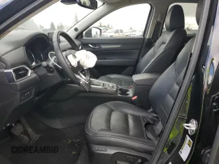 2020 Mazda CX-5 Grand Touring with VIN JM3KFADM3L0815055, listed as a Copart auction lot 48175245 with 56,602 mi miles and Salvage Title. Bid and sale history available at carsss.com. Image 7.