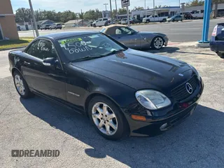 2002 Mercedes-Benz SLK-Class 2.3L Kompressor with VIN WDBKK49FX2F265220, listed as a Copart auction lot 84038354 with 90,860 mi miles and Clean Title. Bid and sale history available at carsss.com. Image 1.