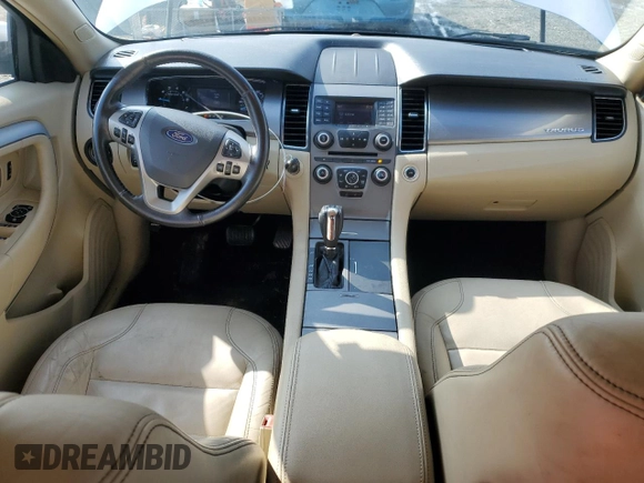 2016 Ford Taurus SEL with VIN 1FAHP2E96GG128073, listed as a Copart auction lot 44019985 with 104,090 mi miles and Salvage Title. Bid and sale history available at DreamBid. Image 8.