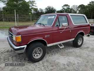 1990 Ford Bronco Custom with VIN 1FMEU15H2LLA70449, listed as a Copart auction lot 77953604 with 12,519 mi miles and Salvage Title. Bid and sale history available at carsss.com. Image 1.