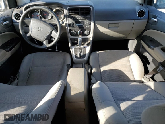 2010 Dodge Caliber Mainstreet z VIN 1B3CB3HA8AD638921, wystawiony jako Copart lot #49871265 z przebiegiem 152 109 mil mil oraz Szkody całkowita. Historia ofert i sprzedaży dostępna na DreamBid. Obrazek 8.