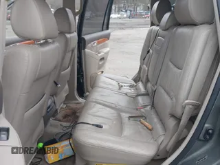 2007 Lexus GX 470 z VIN JTJBT20X970142136, wystawiony jako IAAI lot #41927552 z przebiegiem 219 725 mil mil oraz . Historia ofert i sprzedaży dostępna na DreamBid. Obrazek 8.