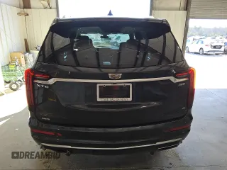 2021 Cadillac XT6 Premium Luxury z VIN 1GYKPDRS7MZ179150, wystawiony jako Copart lot #44894625 z przebiegiem 48 869 mil mil oraz Czysty tytuł • Clean title. Historia ofert i sprzedaży dostępna na DreamBid. Obrazek 6.