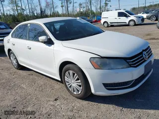2014 Volkswagen Passat Wolfsburg Ed with VIN 1VWAT7A36EC103388, listed as a IAAI auction lot 41718215 with 182,327 mi miles. Bid and sale history available at carsss.com. Image 1.