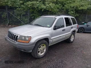2004 Jeep Grand Cherokee Laredo with VIN 1J4GW48N34C145956, listed as a IAAI auction lot 42201114 with 137,815 mi miles and . Bid and sale history available at DreamBid. Image 2.
