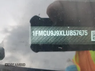 2020 Ford Escape Titanium z VIN 1FMCU9J9XLUB57675, wystawiony jako Copart lot #57777795 z przebiegiem Nie podano mil oraz Szkoda całkowita • Salvage title. Historia ofert i sprzedaży dostępna na DreamBid. Obrazek 13.