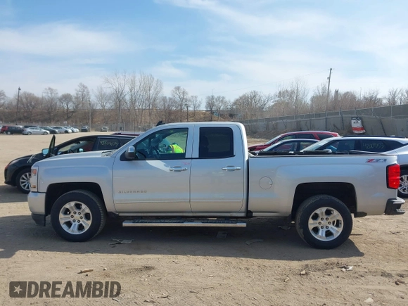 2016 Chevrolet Silverado 1500 LT with VIN 1GCVKREC4GZ125676, listed as a IAAI auction lot 42006237 with 114,699 mi miles. Bid and sale history available at carsss.com. Image 14.