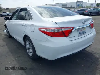 2015 Toyota Camry XLE with VIN 4T1BF1FK3FU114299, listed as a IAAI auction lot 42024946 with 152,972 mi miles. Bid and sale history available at carsss.com. Image 3.