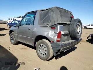 1995 Chevrolet Tracker z VIN 2CNBJ186XS6926688, wystawiony jako Copart lot #77487204 z przebiegiem 17 598 mil mil oraz Szkoda całkowita • Salvage title. Historia ofert i sprzedaży dostępna na DreamBid. Obrazek 2.