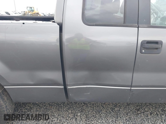 2005 Ford F-150 STX with VIN 1FTRX12W65NA60997, listed as a IAAI auction lot 41836976 with 170,400 mi miles. Bid and sale history available at carsss.com. Image 6.