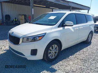 2016 Kia Sedona LX with VIN KNDMB5C10G6183002, listed as a IAAI auction lot 41629853 with 129,322 mi miles. Bid and sale history available at carsss.com. Image 2.