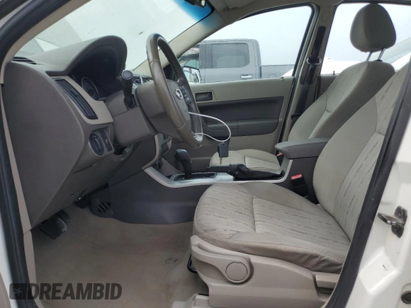 2010 Ford Focus SE with VIN 1FAHP3FN5AW293143, listed as a Copart auction lot 71112144 with 196,239 mi miles and Salvage Title. Bid and sale history available at DreamBid. Image 7.