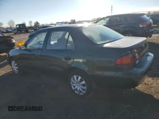 2002 Toyota Corolla CE with VIN 2T1BR12EX2C875267, listed as a Copart auction lot 77607294 with 267,148 mi miles and Clean title. Bid and sale history available at DreamBid. Image 2.